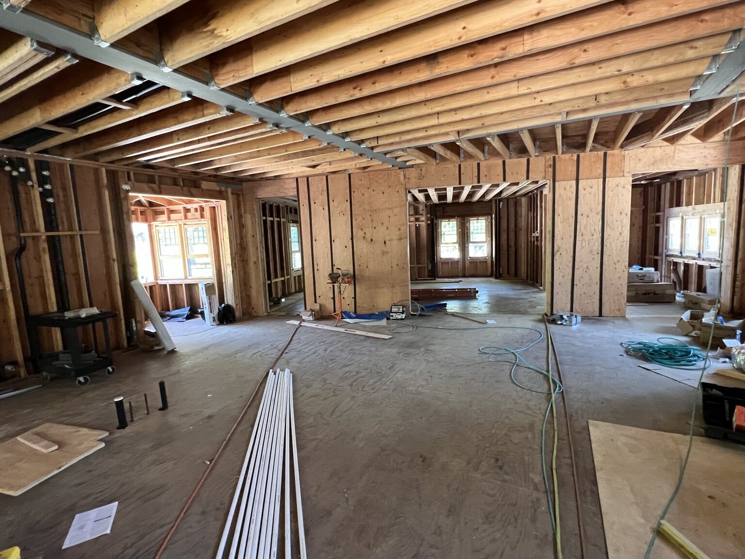 Exposed interior framing and structural work during the Los Gatos rebuild