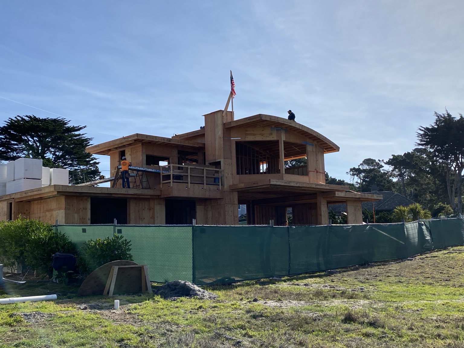 Wide view of the multi-level Pebble Beach custom home framing