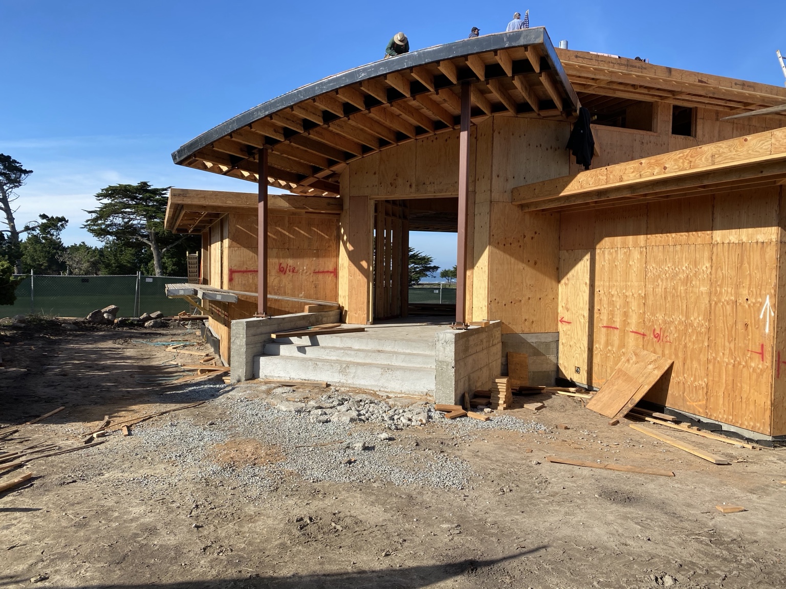 Curved roof overhang and structural steel at the Pebble Beach custom home